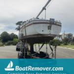 Sailboat hauling to be disposed from Crawfordville, Florida